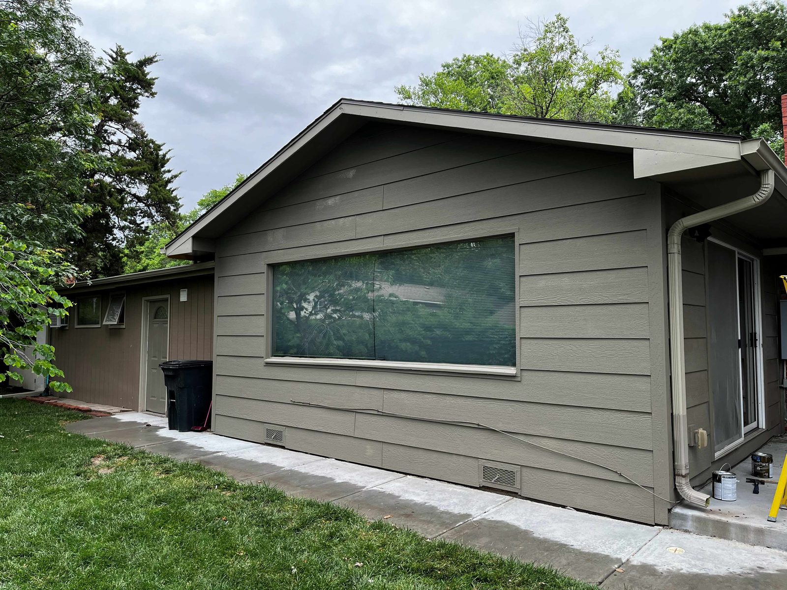 Residential lap siding and gutters